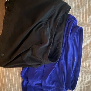 Athleta Black skirt and blue skirt with shorts liner